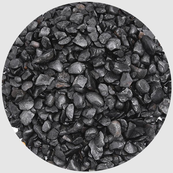 Black Pebbles collection showcasing smooth polished dark stones and natural pebbles