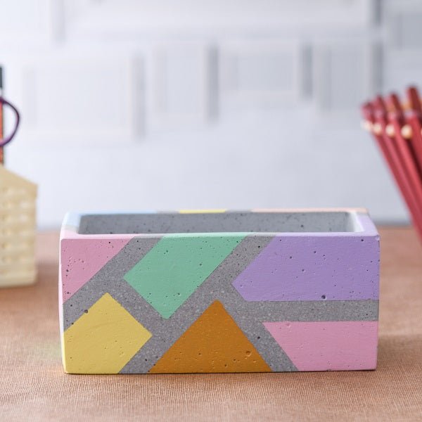 Multicolor Planters collection showcasing vibrant assorted ceramic pots in bright colors